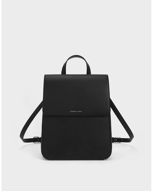 Charles & Keith Black Octavia Front Flap Structured Backpack