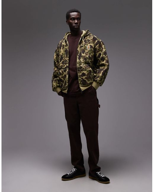 Carhartt – vista – gesteppte oversize-kapuzenjacke mit military-muster in Brown für Herren