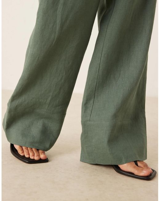 Pantalon d'ensemble fluide en lin noué à la taille - sauge Mango en coloris Green