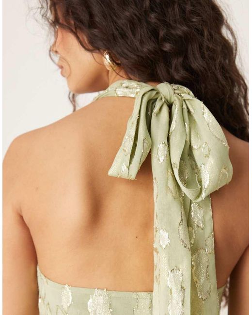 Vestito Lungo Allacciato Al Collo Color Salvia Metallizzato di Never Fully Dressed in Natural