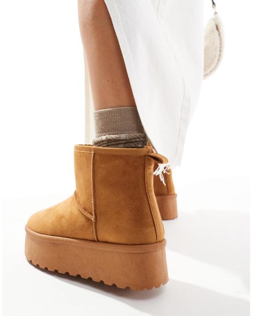SEQWL White Flatform Boots