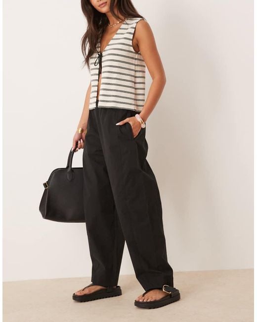 Mango Broek Met Wijde Ronde Pijpen in het Black