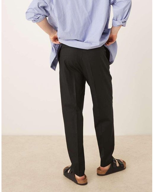 Pantalones De Vestir Negros De Corte Tapered Holgado Con Pinzas Delanteras De Mezcla De Lino De ASOS de hombre de color Black