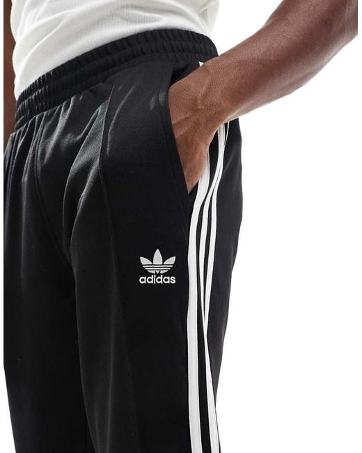 Adidas Originals Blue Adicolour Flare Tracksuit Bottoms for men