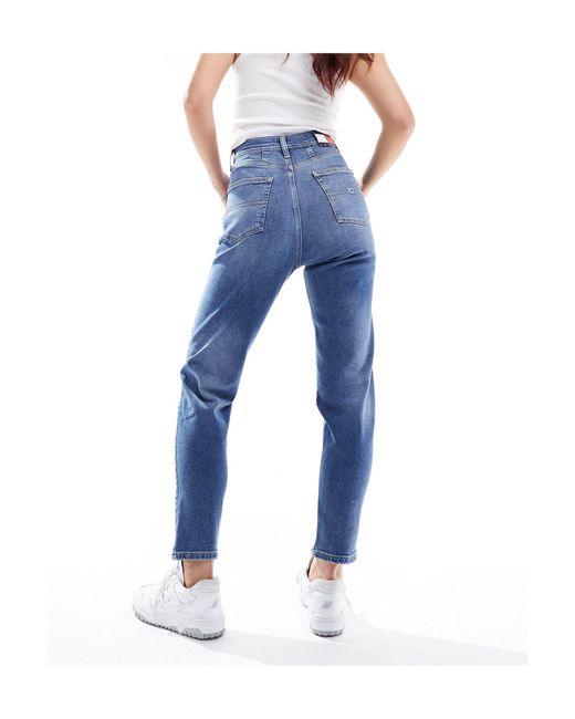 Mom jeans a vita ultra alta lavaggio medio di Tommy Hilfiger in Blue