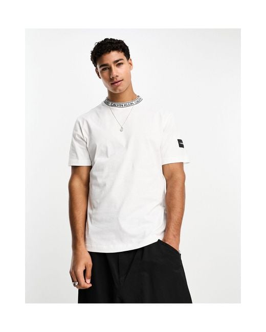Shop Fendi Logo Tape Collar Long-Sleeve T-Shirt