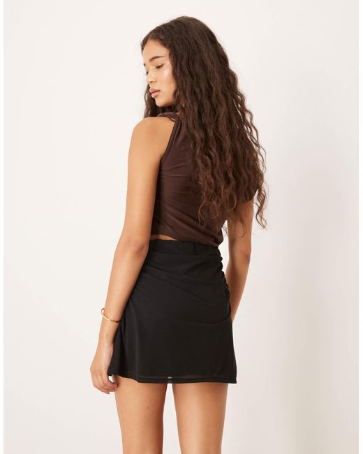 Mini-jupe en tulle à détails froncés ASOS en coloris Black