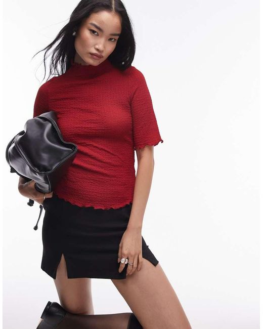 Top Con Cuello Alto, Mangas Hasta El Codo Y Bordes Ondulados De Punto Liso De & Other Stories de color Red