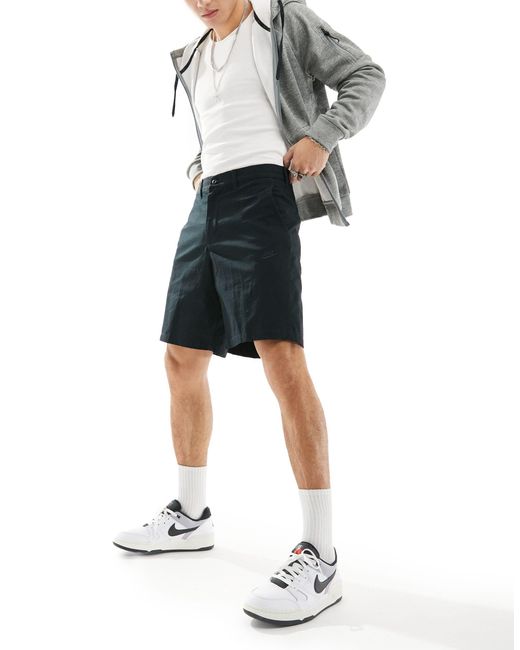 Nike – club – chino-shorts aus webstoff in Black für Herren