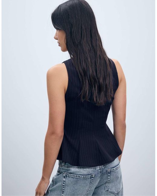 Top sans manches rayé à basque Stradivarius en coloris Blue