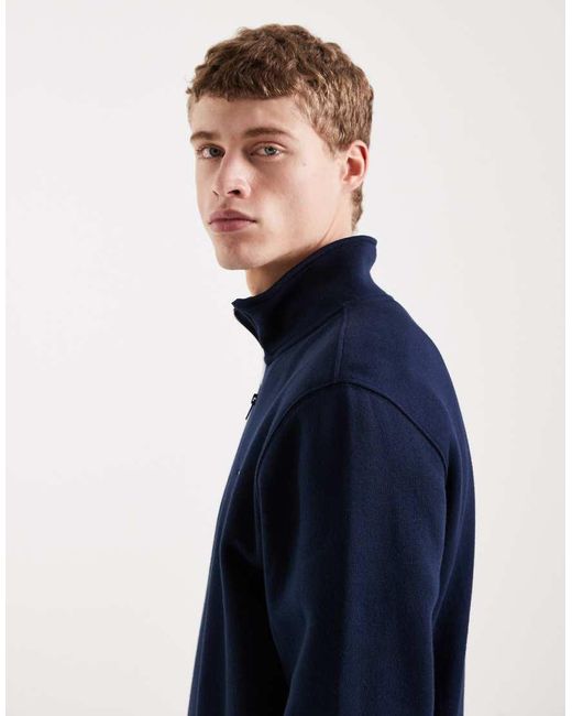 Tommy Hilfiger Blue Badge 1/4 Zip Fleece Sweatshirt for men