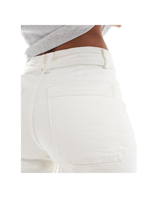 Jeans a fondo ampio sporco di Mango in White
