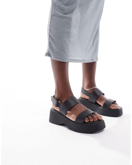 Thilda - sandali neri con suola spessa e cinturino sul retro di ALDO in Gray