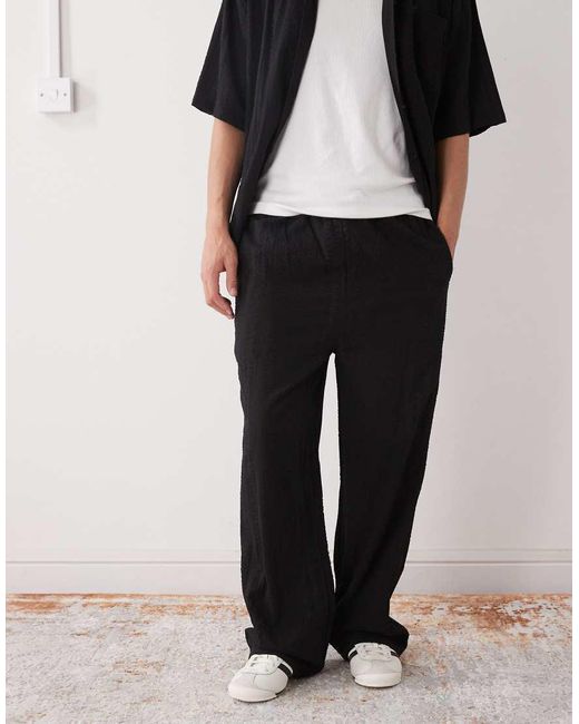 Pantaloni Neri Testurizzati di Collusion in White da Uomo