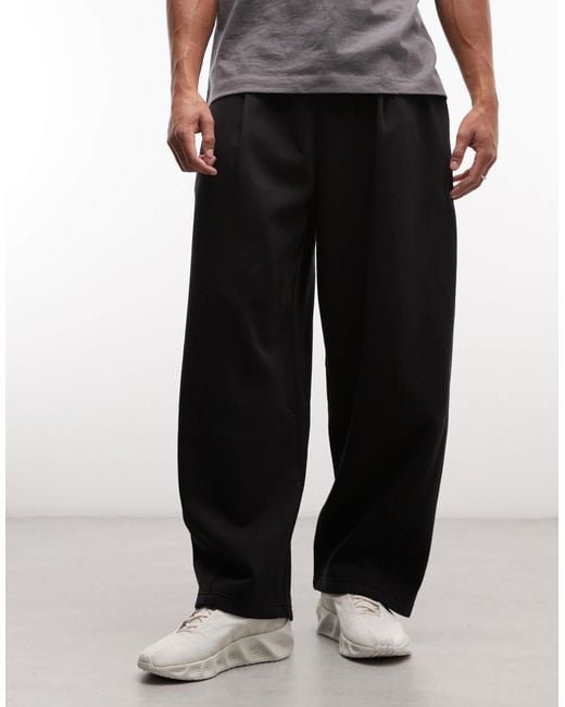 Rahtech Weekday Weekday Wide Barrel Leg Pleated joggers in Black for Men | Lyst