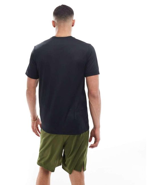 Camiseta Negra Con Estampado Gráfico Dri-Fit De Nike de hombre de color Blue