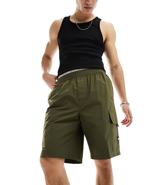 Tommy Hilfiger – aiden – funktions-shorts in Green für Herren