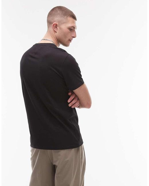 Camiseta Negra Con Logo De Bandera Neon Pop De Plus Tommy Hilfiger de hombre de color Black