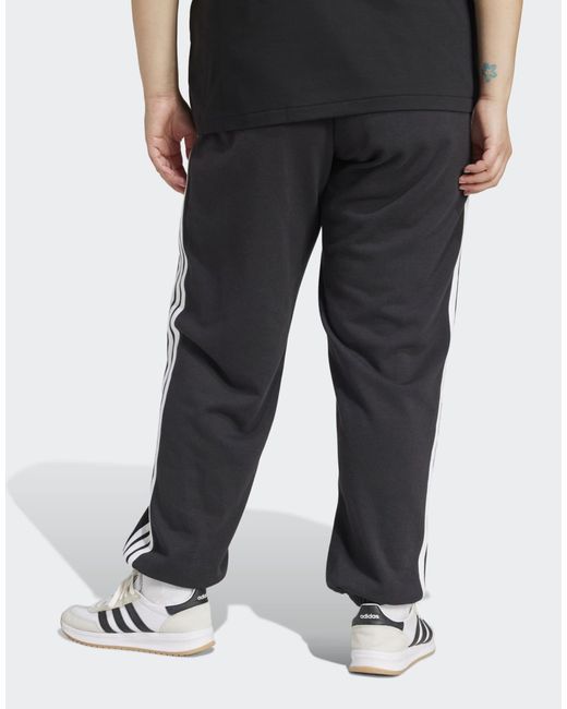 Adidas Originals Black Essentials 3-Streifen French Terry Cuffed Hose