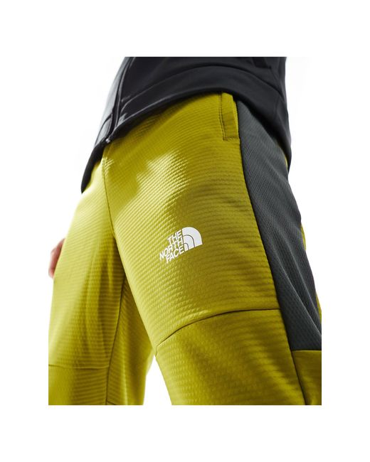 The North Face Training – mountain athletics – fleece-jogginghose in Green für Herren