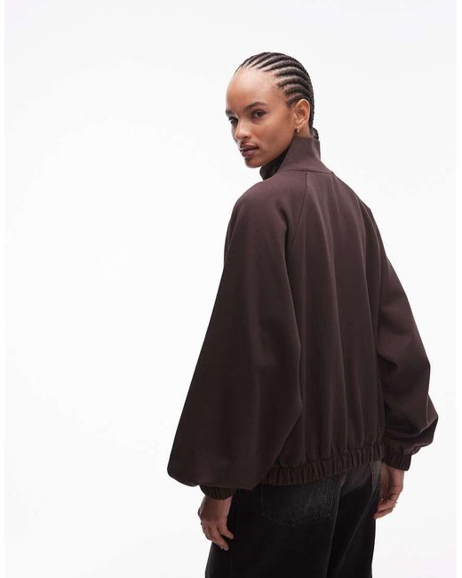 Sudadera Marrón Extragrande Con Cuello Alzado, Cremallera Y Bolsillos De Tejido Interlock De ASOS de color Brown