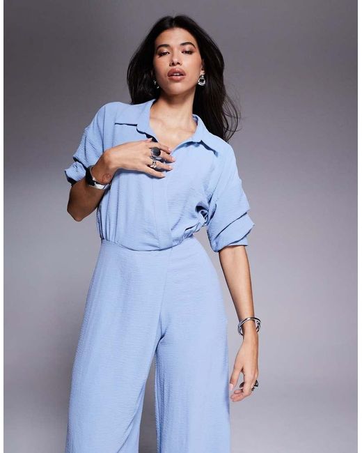 Tuta Jumpsuit A Fondo Ampio Drappeggiata Con Colletto di ASOS in Blue