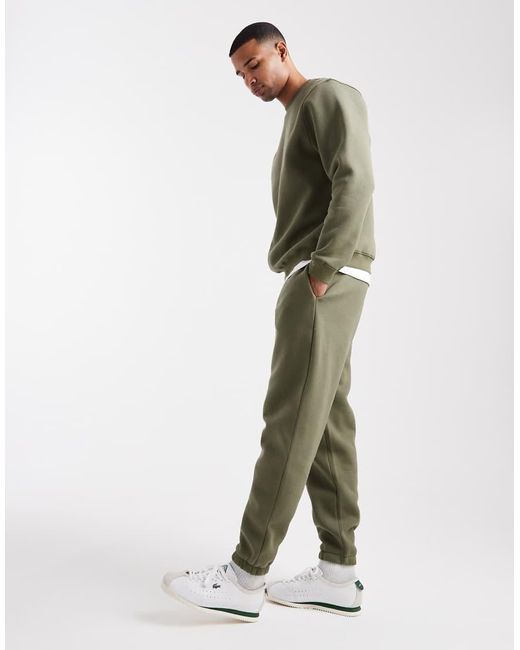 Joggers Caquis Básicos De Corte Tapered De -Verde ASOS de hombre de color Green