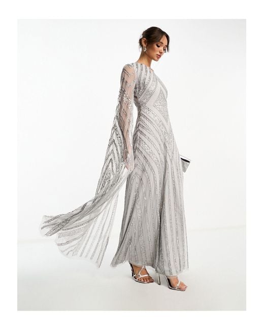 Frock and Frill White Allover Embellished Maxi Dress With One Shoulder Cape Detail
