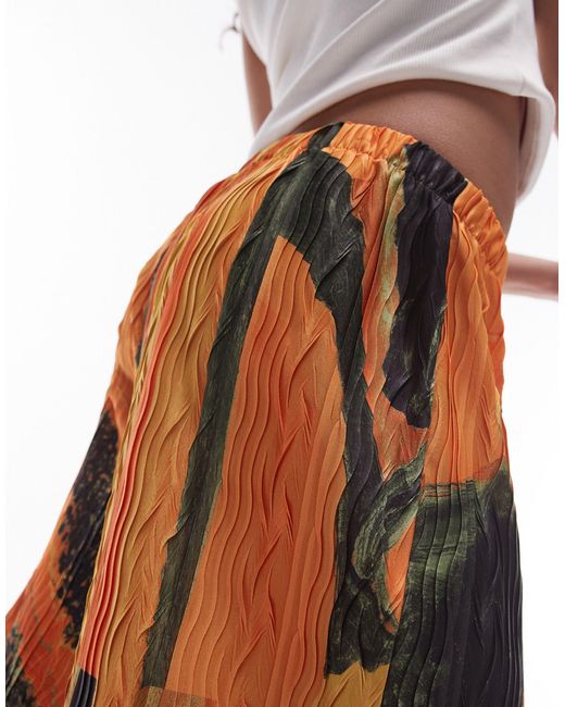 TOPSHOP Orange – plissee-hose mit knitterstruktur und abstraktem papaya-print