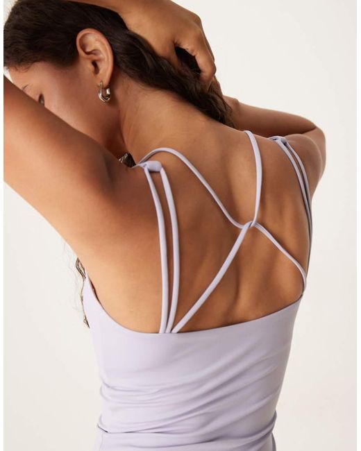 Camiseta Deportiva De Tirantes Con Detalle De Tiras Skinluxe De -Morado Tala de color Purple