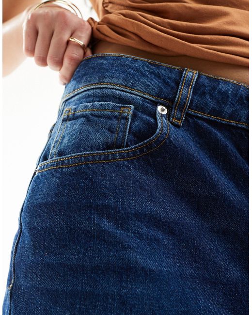 Short en jean long coupe baggy - délavage foncé ASOS en coloris Blue