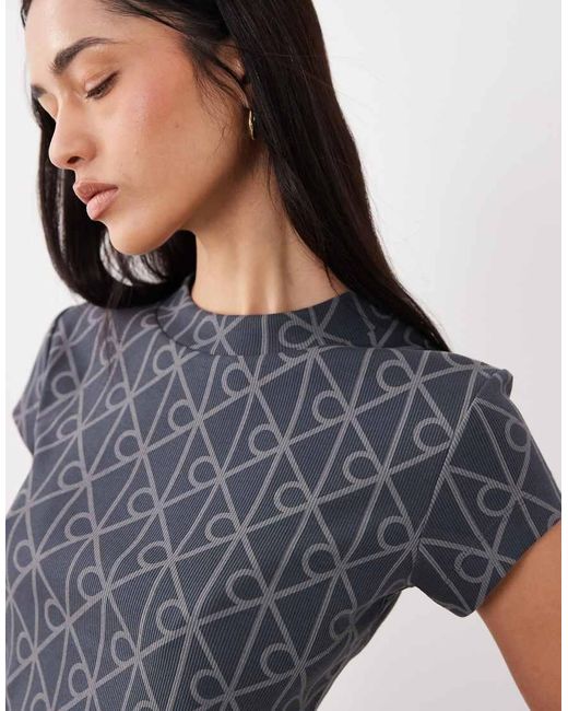 Calvin Klein Blue Embossed Logo Cropped Baby Tee