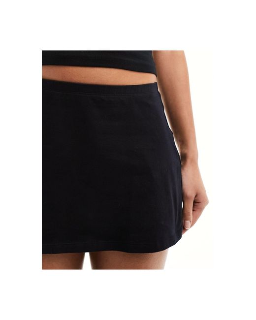 Motel Black Classic Low Rise Jersey Mini Skirt