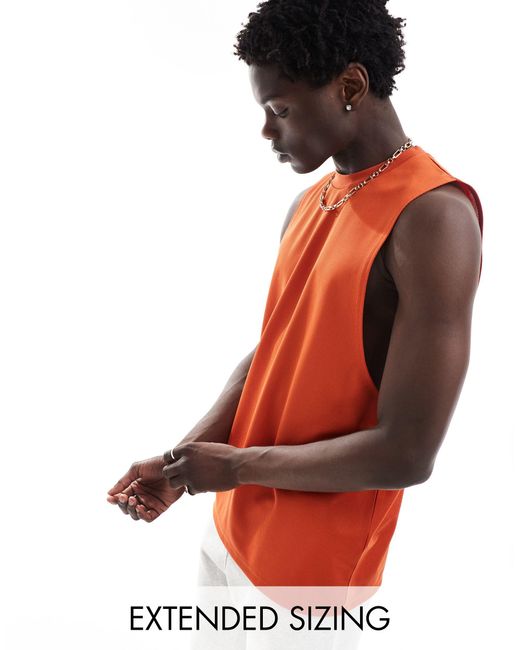 Camiseta neón sin mangas holgada ASOS de hombre de color Orange