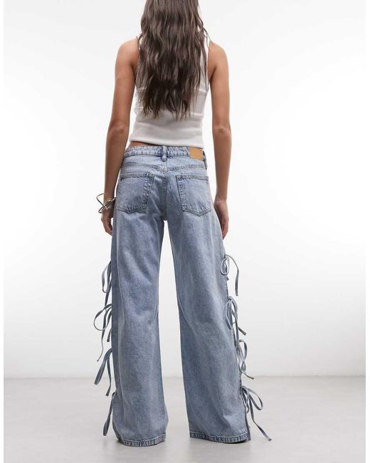 Monki Blue Low Waist Wide Leg Jeans With Side Tie Bow Detail