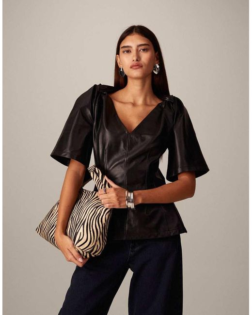 ARRANGE Black Leather Twist Shoulder Top