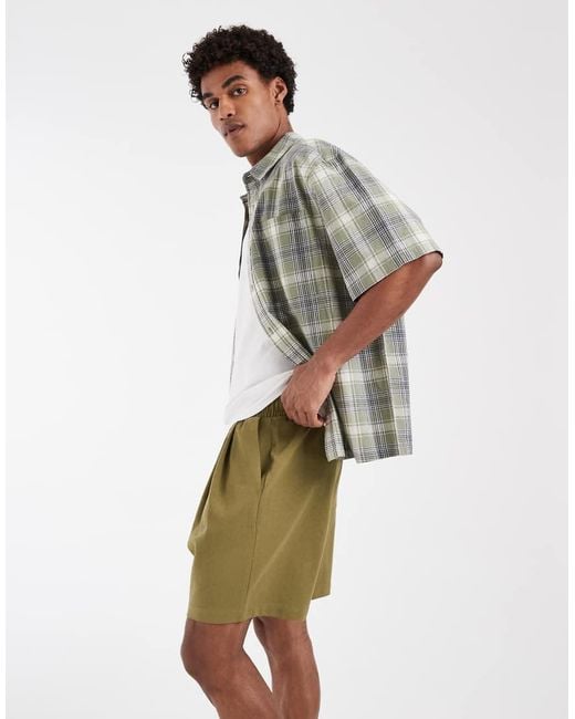 ASOS Green Circular Design Collection Pleated Oversized Jersey Shorts for men