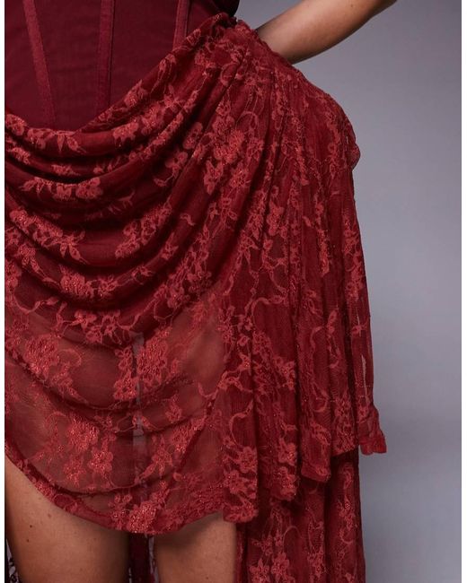 ASOS Red Premium Hitched Corset Lace Mini Dress With Hip Pads And High Low Skirt