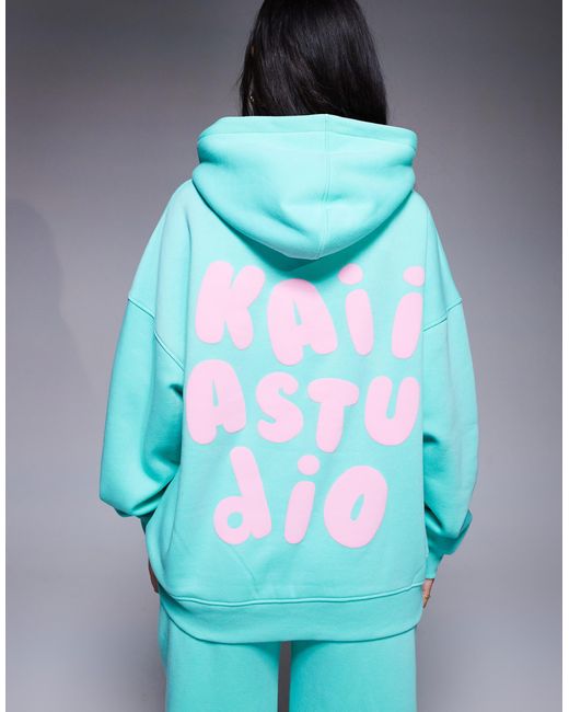 Sweat à capuche oversize d'ensemble en coton mélangé avec logo imprimé en relief - turquoise et rose pastel Kaiia en coloris Blue