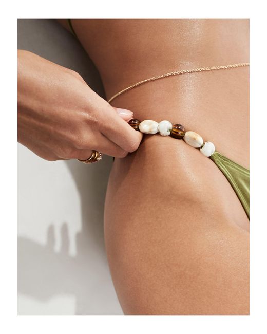 Slip bikini sgambati lucido con perline di South Beach in Brown