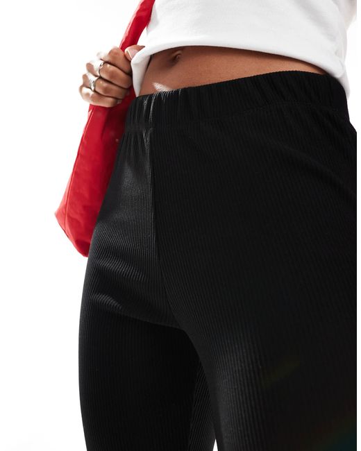 Pantalon évasé côtelé à taille haute ONLY en coloris Black