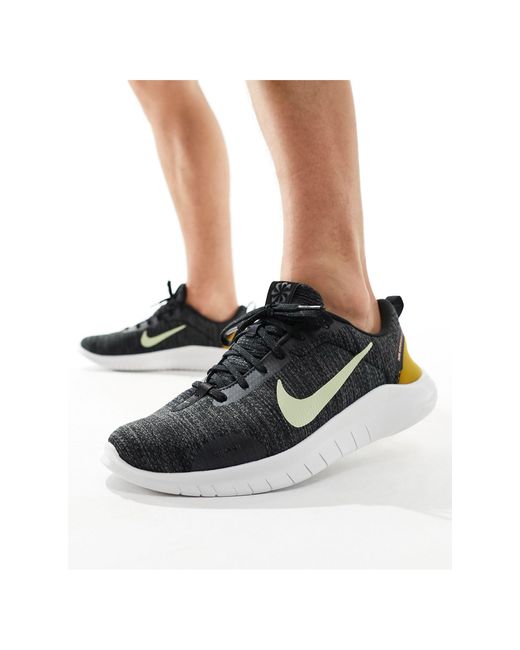 Flex experience 12 - sneakers nere e oliva di Nike in Black da Uomo