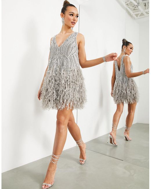 asos crystal and bead mini dress ASOS DESIGN embellished beaded mini dress in black and gold
