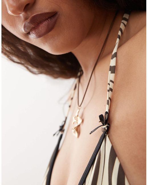 Lioness Brown – gisele – neckholder-bikinioberteil mit zebramuster, kontrastrand und schleifendetail, kombiteil