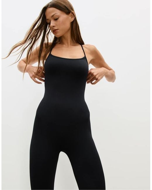 Tuta Jumpsuit Nera Senza Cuciture di Stradivarius in Black