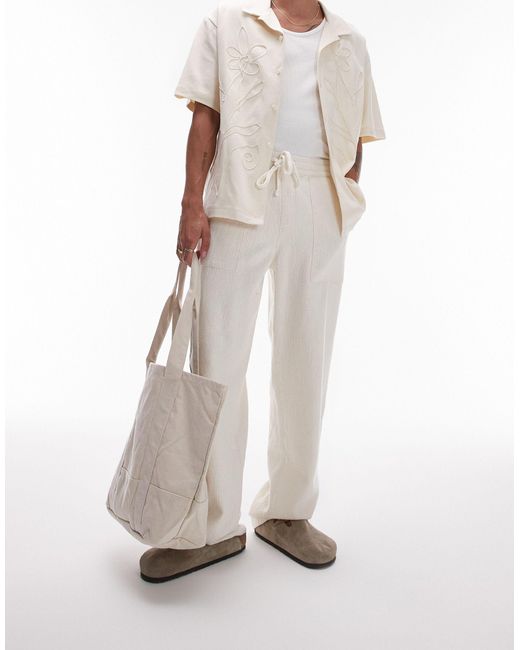 Pantaloni a fondo ampio testurizzati écru di Topman in White da Uomo
