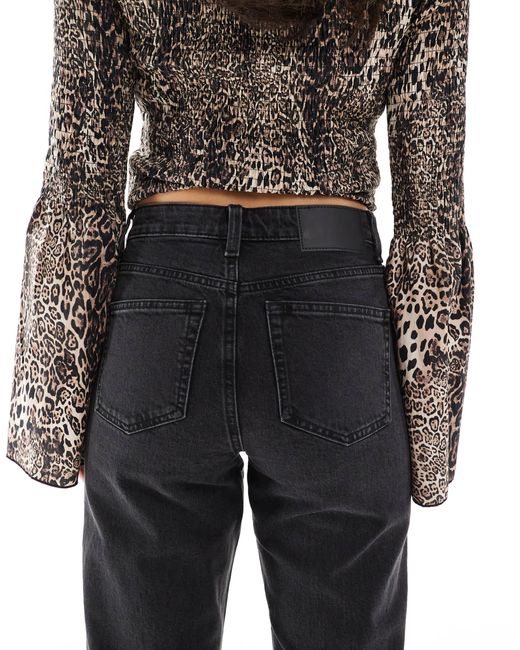 Jean droit stretch confortable - délavé ASOS en coloris Black