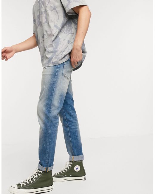 mens stretch tapered jeans