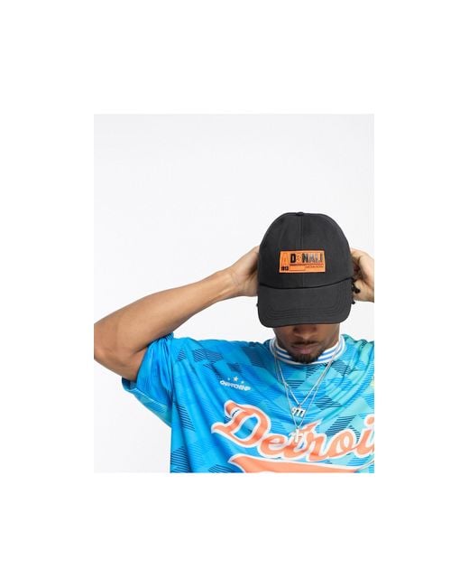 Cappello con visiera morbido nero con logo arancione da Uomo di ASOS in Blu  | Lyst