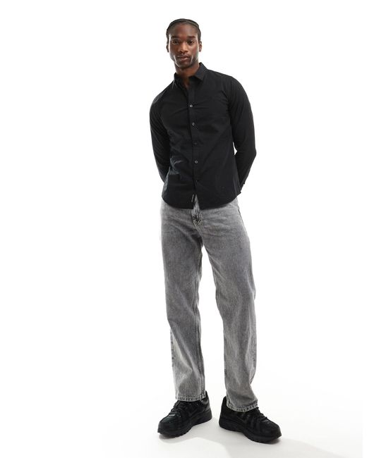Calvin klein - camicia di jeans slim elasticizzata nera di Calvin Klein in Black da Uomo